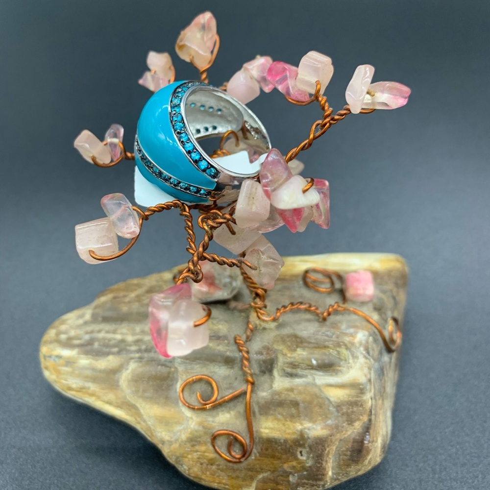 Blue topaz platinum embraced sterling silver ring